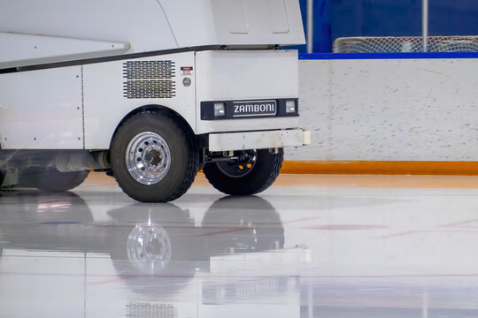 Calgary, Alberta, Canada. Jan 23, 2026. A white Zamboni ice resurfacer machine smoothing the surface of a professional hockey rink.