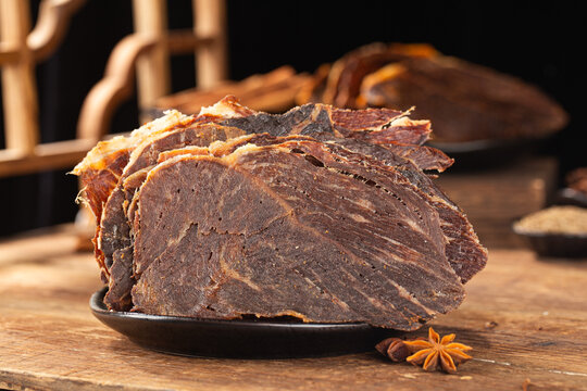 Dried beef crisps, beef crisps on a wooden background