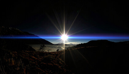 bright luminous glowing star rise in the mountaiuns