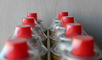 A supply of new gas cylinders sealed in film four units per package
