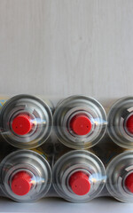 Transparently wrapped collet gas cylinders for portable torches
