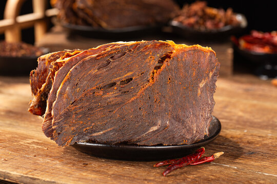 Dried beef crisps, beef crisps on a wooden background