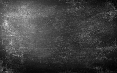 Fototapeta premium Black Blackboard Chalkboard texture. Empty blank dark dirty school board wall banner background backdrop with traces of chalk for text. School, Cafe, bakery, restaurant menu template wallpaper
