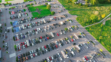 Large parking area full with cars © AlexGo