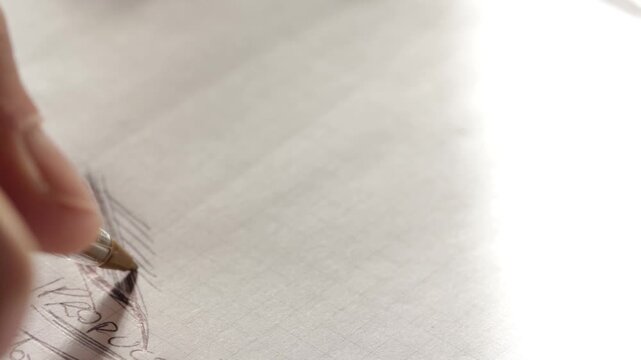 Hand sketching a pen outline sketch prototype. Drawing a technical concept