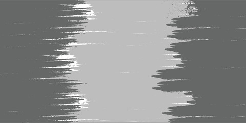 Abstract gray paint splatters and brush strokes on a white background