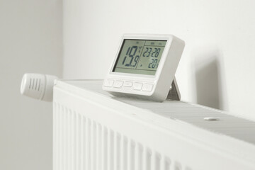Programmable Thermostat for Home Heating and Cooling Control