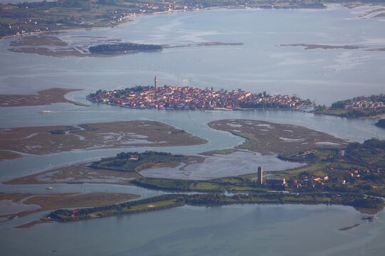 Burano island town in the Venetian Lagoon, Italy. Aerial view.