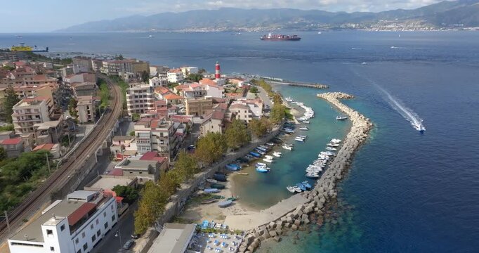 Aerial view of Villa San Giovanni town, located in the province of Reggio Calabria, Italy. It is a port city overlooking the Messina Strait. Across the channel of sea lies the eastern coast of Sicily.