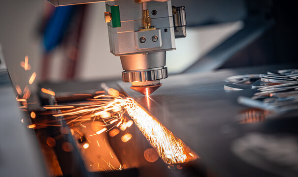 CNC Laser cutting of metal, modern industrial technology.