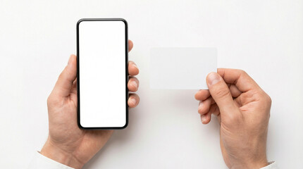 Person holding smartphone and blank card on white background  