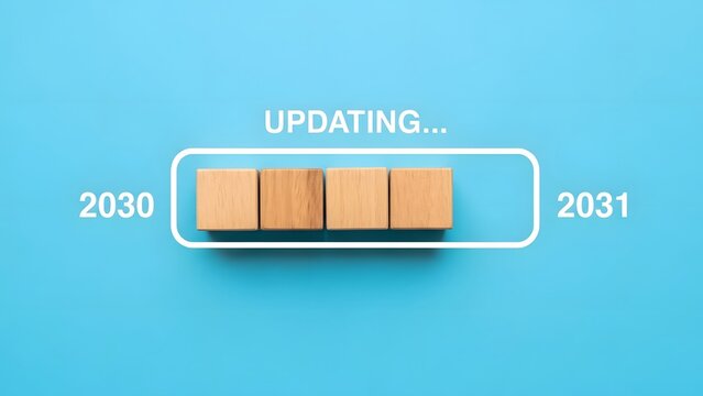 Wooden blocks in progress bar showing updating from 2030 to 2031