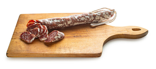 sliced ​​dried sausage on a wooden kitchen board
