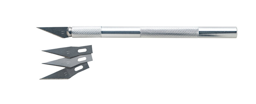 Close-up of a stationery scalpel on a white isolated background