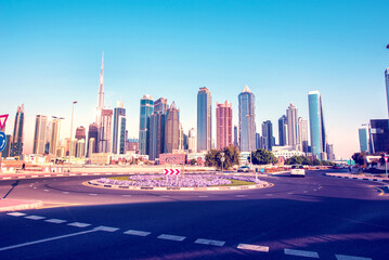 Charming cityscape with skyscrapers at a roundabout  in Dubai, UAE.