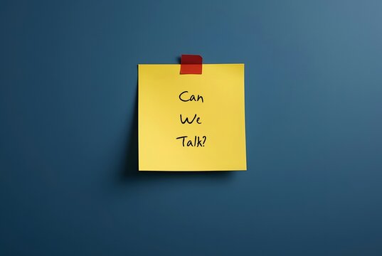 Note stick on blue wall asking CAN WE TALK? - concept of difficult conversation, to approach for having serious talk to solve conflicts or relationship issues
