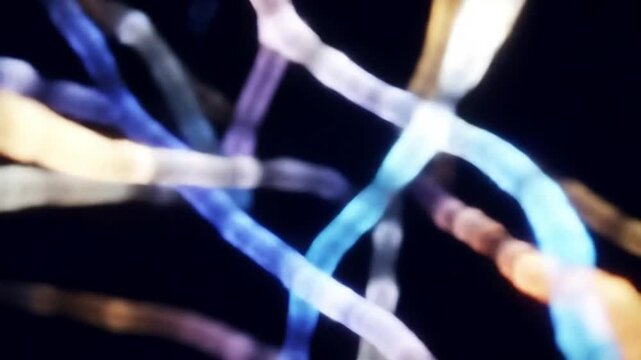 Abstract illustration of colorful lines crossing on a dark background