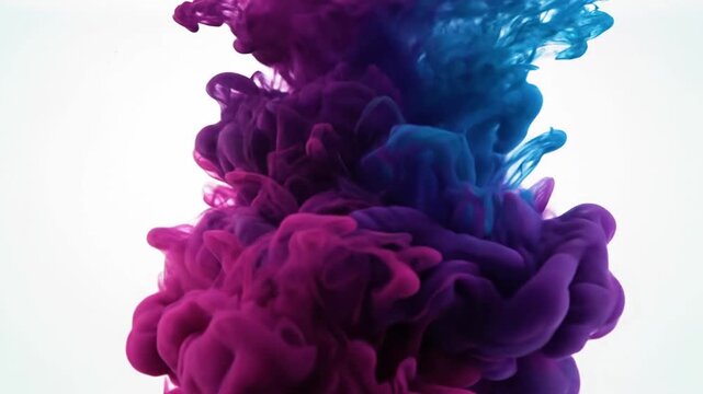 Abstract ink flow in water with vibrant colors on a bright background