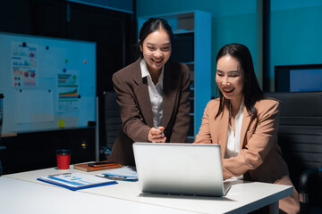 Diverse professionals collaborate on project analysis with financial graphs. Strategic teamwork and insights drive company growth and success.