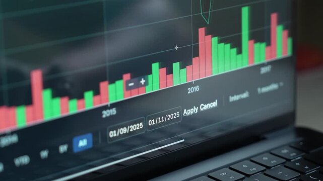 close up smartphone with laptop and open stock exchange, trading Online app interface. Man hand scrolling touch screen analysing chart forex crypto currency.