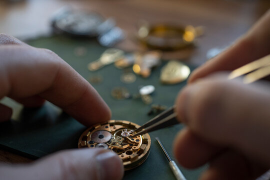 Mechanical watch repair. Watchmaker is repairing the mechanical watches