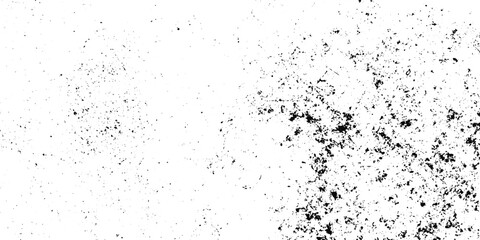 Obraz premium Black and White Gritty Sprayed Ink Texture with Rough Vintage Distress Effect.Minimalist grunge background artwork featuring worn ink splatter, scratches, and aged abstract texture.