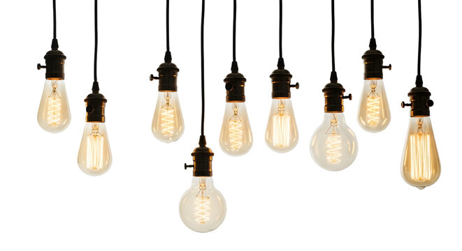 A collection of illuminated vintage edison light bulbs with glowing filaments, isolated on transparent background.