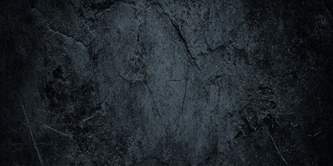 Fototapeta premium Dramatic dark wall concrete texture with heavy scratches weathered grit deep scratches, scuffs, and a weathered concrete appearance.