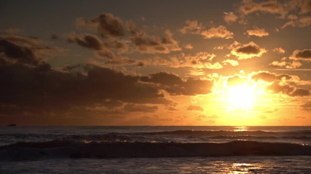 Sunset above the Adria Sea with small island with seabirds, Ulcinj, Montenegro