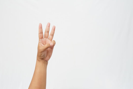 Left hand gesturing the number three with three fingers up and thumb holding little finger, Isolated on white background for counting and educational concepts