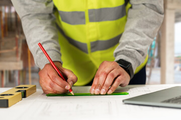 Engineering hands, drawing and blueprint planning at construction site, warehouse and outdoor development. Architecture contractor, project manager or person with floor plan, lines and sketch tools