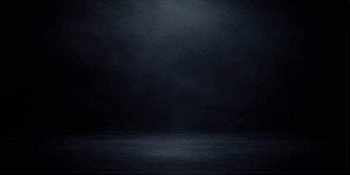 Dark blue grunge background with a central spotlight effect on a vintage textured concrete wall surface featuring an empty black chalkboard pattern and subtle smoke design