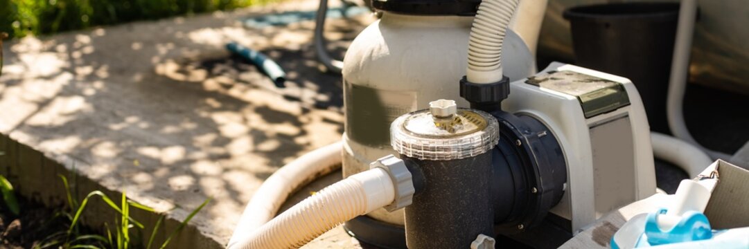 Pump of filtration, ozonation system is used to maintain clean, sanitary environment an outdoor swimming pool
