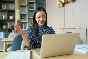 Asian Businesswoman VDO Call Conference Work &nbsp;talk chat online  video call on laptop webcam conference working with laptop online briefing E learning and social distancing concept