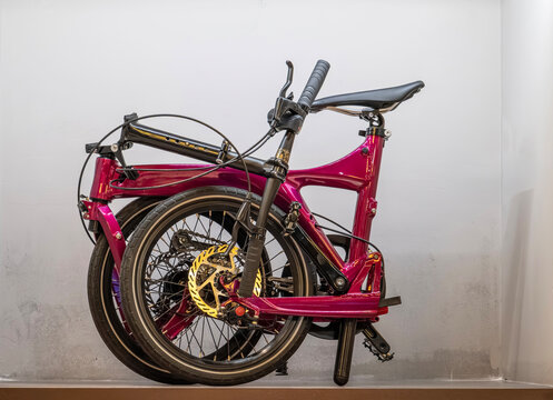 a full-suspension folding bike with a durable monocoque aluminum frame on the shelf