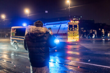 During debates over a fireworks ban in Germany, ambulances and police vehicles drive up and down the streets on New Year’s Eve. © Ben D.