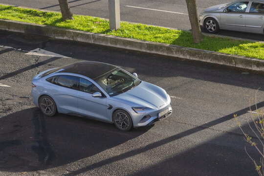 Byd seal electric car driving on city street