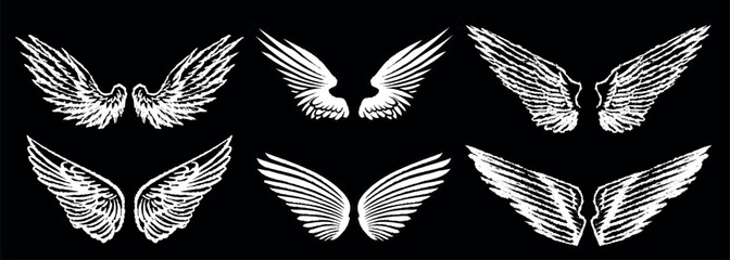 Grunge angel wings. street art style drawing. brush drawn elements. Can be used as bird, devil or creature wings. Symbol of freewill peace and heaven. © artbalitskiy