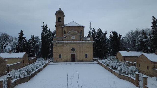 Fano church with snow in Eremo of Monte Giove 4k