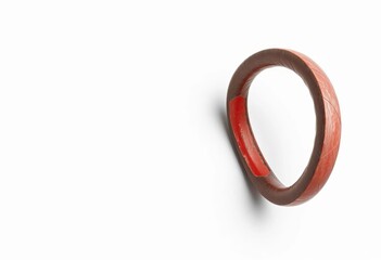 Flexible graphite pencil contorted into a spiral shape, closeup, texture