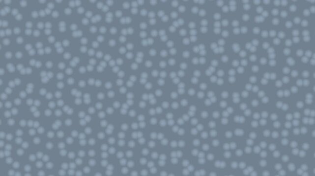 Abstract slate gray background animation featuring small soft circles that gently drift and change positions over time. The subtle moving pattern creates a calm, modern atmosphere.