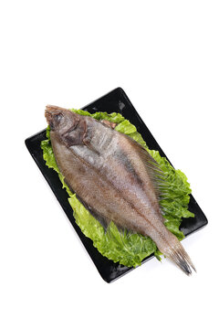 Fresh Dalian Flounder Fish on Black Tray with Lettuce - Premium Deep Sea Seafood Catch