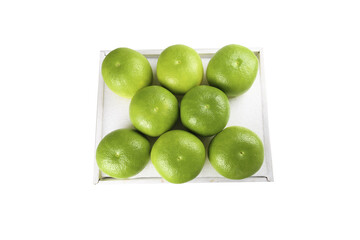 Obraz premium Fresh Green Grapefruits from Taiwan in Shipping Box - Emerald Citrus Fruit Export Shipment