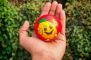 Pineapple themed smiley emoji stress ball