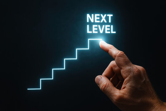 Hand reaching toward a glowing digital staircase symbolizing progression and strategy for next level success