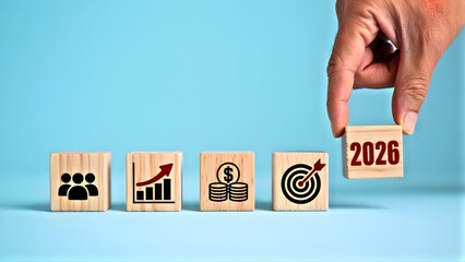Strategic planning for achieving business goals and targets in 2026 with teamwork and financial growth represented by wooden blocks