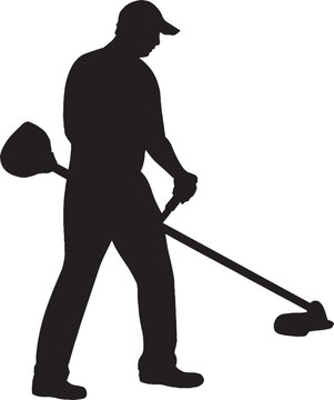 Silhouette of Gardener Mowing Lawn with String Trimmer