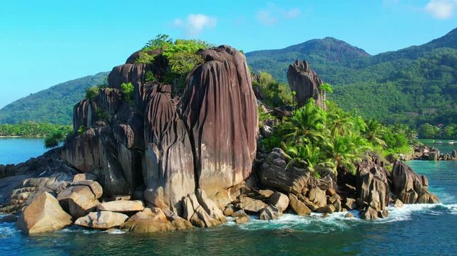 Seychelles Mah&eacute; island sea cliffs with palm trees, aerial view