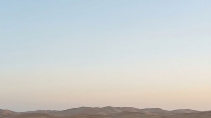 Desert Landscape At Dusk With Soft Pastel Sky Over Rocky Outcrops