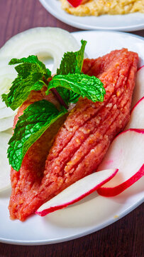 Raw kibbeh with mint, a traditional dish from Arab cuisine.